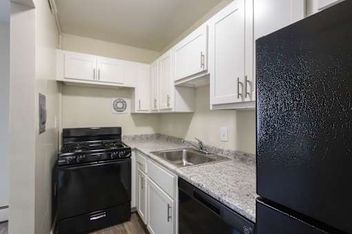 This is a photo of the kitchen in the 543 square foot B-style, 1 bedroom, 1 bath apartment at Blue Grass Manor Apartments in Erlanger, KY.