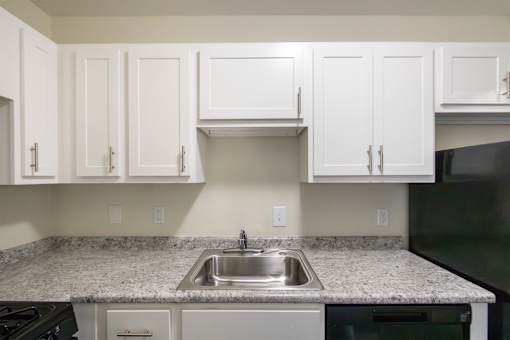 This is a photo of the kitchen in the 543 square foot B-style, 1 bedroom, 1 bath apartment at Blue Grass Manor Apartments in Erlanger, KY.