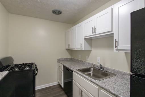 This is a photo of the kitchen in the 543 square foot A-style, 1 bedroom, 1 bath apartment at Blue Grass Manor Apartments in Erlanger, KY.
