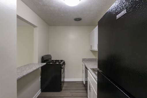 This is a photo of the kitchen in the 543 square foot A-style, 1 bedroom, 1 bath apartment at Blue Grass Manor Apartments in Erlanger, KY.