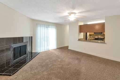 This is a photo of the living room in the 982 square foot 1 bedroom, 1 bath apartment at Cambridge Court Apartments in Dallas, TX.