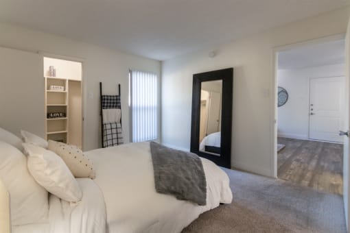 This is a photo of the bedroom of the 515 square foot 1 bedroom apartment at Canyon Creek Apartments in Dallas, TX