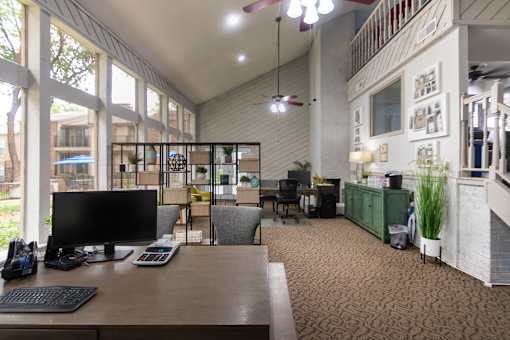 This is a picture of the leasing office with coffee bar at Canyon Creek in the Midtown neighborhood of Dallas, TX .