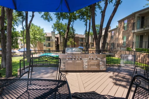 This is a photo of BBQ area/patio at Canyon Creek Apartments in Dallas, TX.