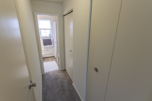This is a photo of the hallway in the 740 square foot 1 bedroom model apartment at Compton Lake Apartments in Mt. Healthy, OH.