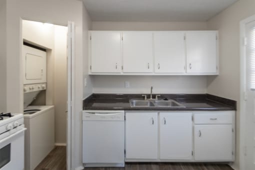 This is a photo of the kitchen of the 1004 square foot, 2 bedroom/1 bath Townhome with stackable washer/dryer floor plan at Colonial Ridge Apartments in the Pleasant Ridge neighborhood of Cincinnati, OH.