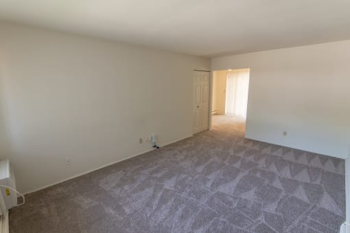 This is a photo of the living room in the 631 square foot, B-style 1 bedroom floor plan at Colonial Ridge Apartments in the Pleasant Ridge neighborhood of Cincinnati, OH.