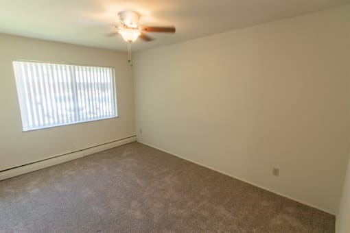 This is a photo of the bedroom in the 631 square foot, B-style 1 bedroom floor plan at Colonial Ridge Apartments in the Pleasant Ridge neighborhood of Cincinnati, OH.