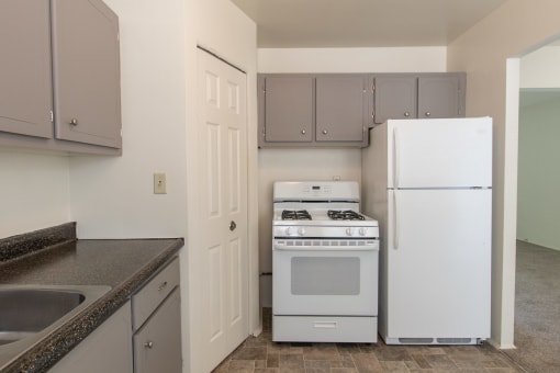 This is a photo of the kitchen in the 1004 square foot, 2 bedroom townhome floor plan at Colonial Ridge Apartments in the Pleasant Ridge neighborhood of Cincinnati, OH.
