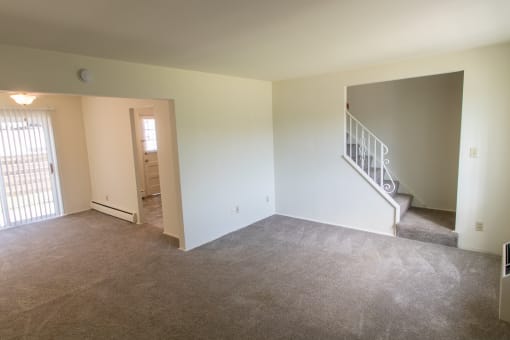 This is a photo of the living room in the 1004 square foot, 2 bedroom townhome floor plan at Colonial Ridge Apartments in the Pleasant Ridge neighborhood of Cincinnati, OH.
