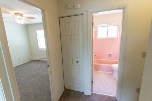 This is a photo of the upstairs hallway in the 1004 square foot, 2 bedroom townhome floor plan at Colonial Ridge Apartments in the Pleasant Ridge neighborhood of Cincinnati, OH.