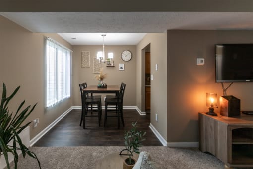 This is a photo of the dining room in the upgraded 650 square foot, 1 bedroom, 1 bath model apartment at Deer Hill Apartments in Cincinnati, Ohio.
