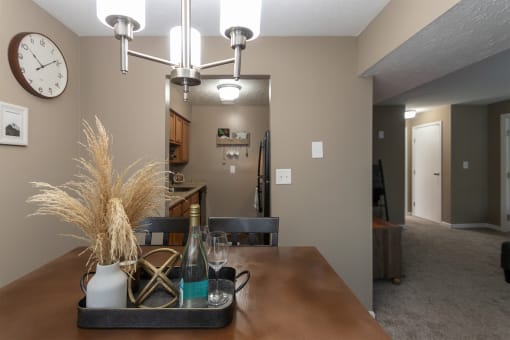 This is a photo of the dining room in the upgraded 650 square foot, 1 bedroom, 1 bath model apartment at Deer Hill Apartments in Cincinnati, Ohio.
