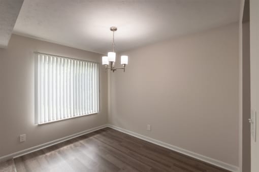 This is a photo of the dining room in an upgraded 950 square foot, 2 bedroom apartment at Deer Hill Apartments in Cincinnati, OH.