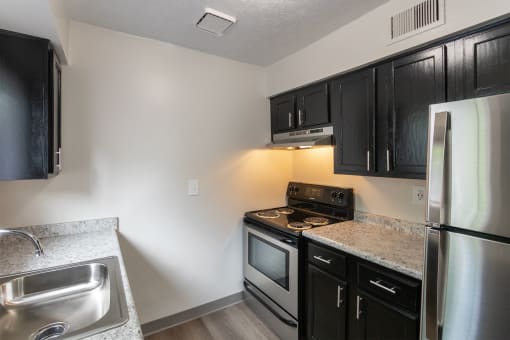 This is a photo of the kitchen in an upgraded 950 square foot, 2 bedroom apartment at Deer Hill Apartments in Cincinnati, OH.