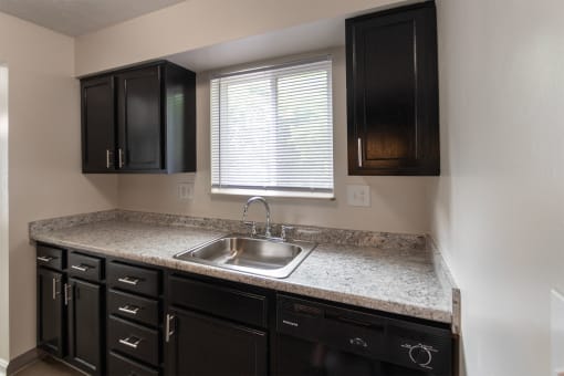 This is a photo of the kitchen in an upgraded 950 square foot, 2 bedroom apartment at Deer Hill Apartments in Cincinnati, OH.