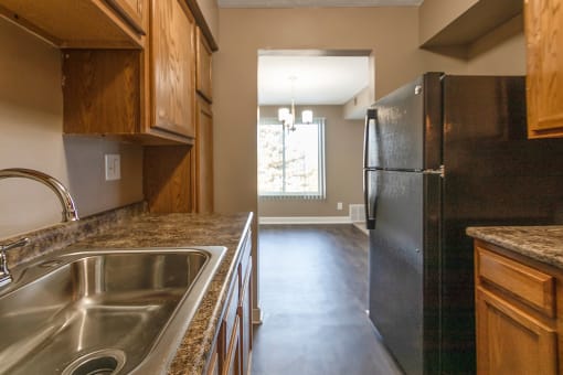 This is a photo of the kitchen of an upgraded 950 square foot, 2 bedroom apartment at Deer Hill Apartments in Cincinnati, OH.