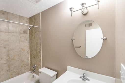 This is a photo of the primary bathroom of an upgraded 950 square foot, 2 bedroom apartment at Deer Hill Apartments in Cincinnati, OH.