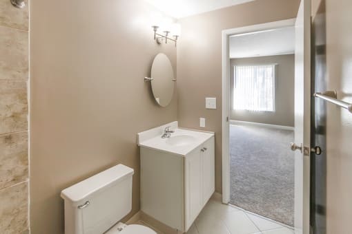 This is a photo of the primary bathroom of an upgraded 950 square foot, 2 bedroom apartment at Deer Hill Apartments in Cincinnati, OH.