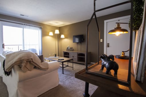 This is a photo of the living room in the 950 square foor, 2 bedroom apartment at Deer Hill Apartments in Cincinnati, OH.