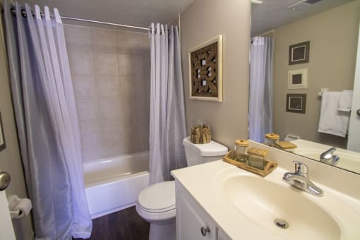 This is a photo of the primary bathroom in the 950 square foor, 2 bedroom apartment at Deer Hill Apartments in Cincinnati, OH.