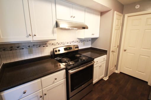 This is a photo of an upgraded kitchen in the 1056 square foot 2 bedroom Gainsway at Trails of Saddlebrook Apartments in Florence, KY.