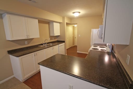 This is a photo of the kitchen in the 1490 square foot 3 bedroom Presidential at Washington Place Apartments in Washington Township, OH.