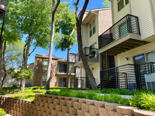 This is a photo of building exteriors/grounds at Canyon Creek Apartments in Dallas, TX.