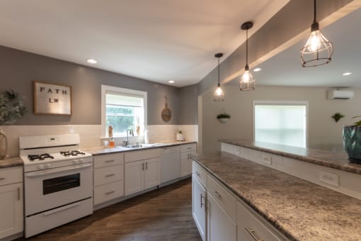 This is a photo of the kitchen in the resident clubhouse at Lake of the Woods Apartments in Cincinnati, OH.