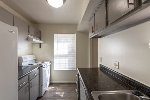 This is a photo of the kitchen of the 1310 square foot 3 bedroom, 1.5 bath Pine floor plan at Montana Valley Apartments in Cincinnati, OH.