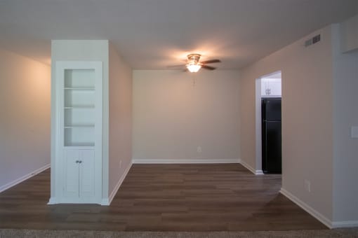 This is a photo the built-in bookshelf and dining area of an upgraded 1030 square foot, Oak 2 bedroom, 1 bath apartment at Montana Valley Apartments in the Westwood neighborhood of Cincinnati, OH.
