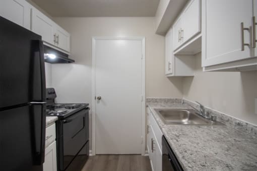 This is a photo the kitchen of an upgraded 1030 square foot, Oak 2 bedroom, 1 bath apartment at Montana Valley Apartments in the Westwood neighborhood of Cincinnati, OH.