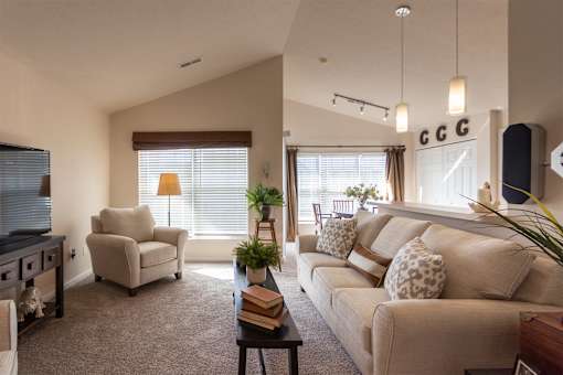 This is a photo of the living room in the 1016 square foot, 2 bedroom, 2 bath Nautica floor plan at Nantucket Apartments in Loveland, OH.