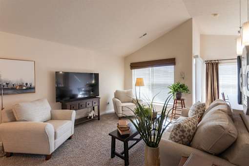 This is a photo of the living room in the 1016 square foot, 2 bedroom, 2 bath Nautica floor plan at Nantucket Apartments in Loveland, OH.