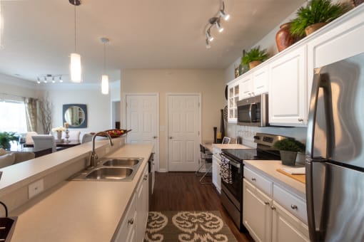 This is a photo of the kitchen in the 2 bedroom, 2 bath Islander floor plan at Nantucket Apartments in Loveland, OH.