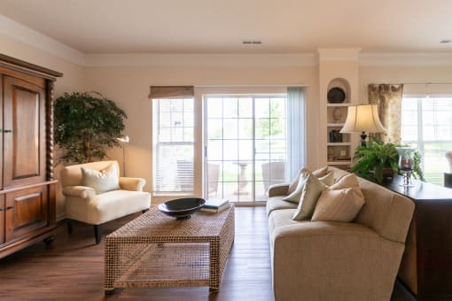 This is a photo of the living room in the 2 bedroom, 2 bath Islander floor plan at Nantucket Apartments in Loveland, OH.