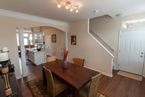 This is a photo of the dining room in the 1242 square foot, 2 bedroom, 2 and 1/2 bath Spinnaker floor plan at Nantucket Apartments in Loveland, OH.