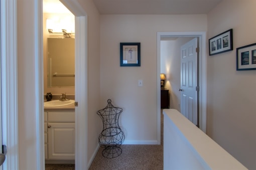 This is a photo of the second floor hallway in the 1242 square foot, 2 bedroom, 2 and 1/2 bath Spinnaker floor plan at Nantucket Apartments in Loveland, OH.