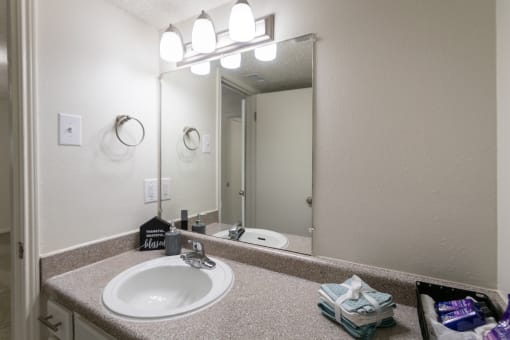 Bathroom With Vanity Lights at Princeton Court, Dallas