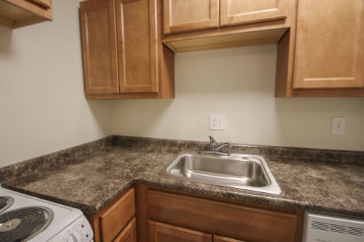 This is a photo of the living room in a 750 square foot 2 bedroom, 1 bath apartment at Park Lane Apartments in Cincinnati, OH.