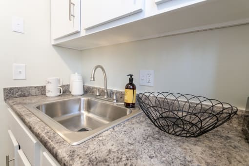 This is a picture of the kitchen in a 576 sq foot 1 bedroom, 1 bath apartment at Red Bank Reserve in the Madisonville neighborhood of Cincinnati, Ohio.