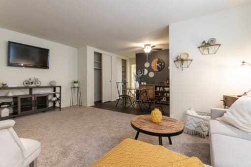 This is a picture of the living room and dining area in a 576 sq foot 1 bedroom, 1 bath apartment at Red Bank Reserve in the Madisonville neighborhood of Cincinnati, Ohio.