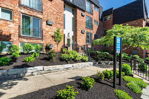 This is a photo of the building entrance to the leasing office at Romaine Court Apartments in the Oakley neighborhood of Cincinnati, Ohio.