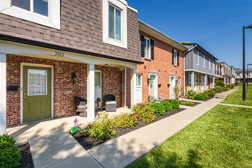 A row of houses with number 3638 on the front.
