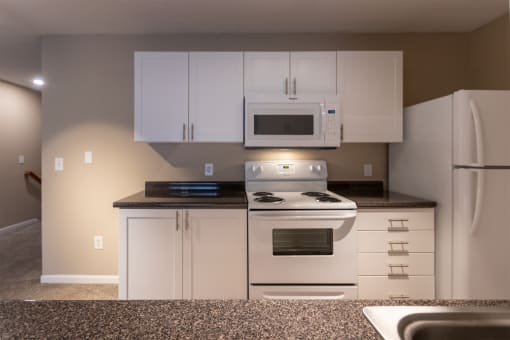 This is a photo of the kitchen in the 1170 square foot 2 bedroom, 2 bath Freedom Balcony at Washington Place Apartments in Miamisburg, Ohio in Washington Township.