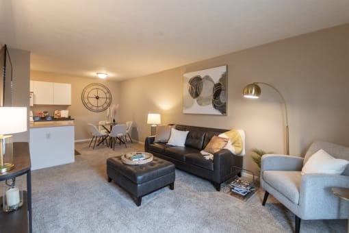 This is a photo of the living room of the 890 square foot 2 bedroom, 2 bath Liberty at Washington Place Apartments in in Miamisburg, Ohio in Washington Township.