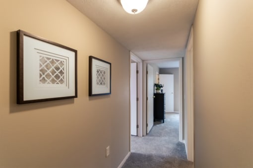 This is a photo of the hallway of the 890 square foot 2 bedroom, 2 bath Liberty at Washington Place Apartments in in Miamisburg, Ohio in Washington Township.