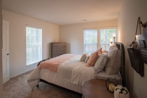 This is a photo of the primary bedrooom of the 1100 square foot 2 bedroom Kettering floor plan at Washington Park Apartments in Centerville, OH.