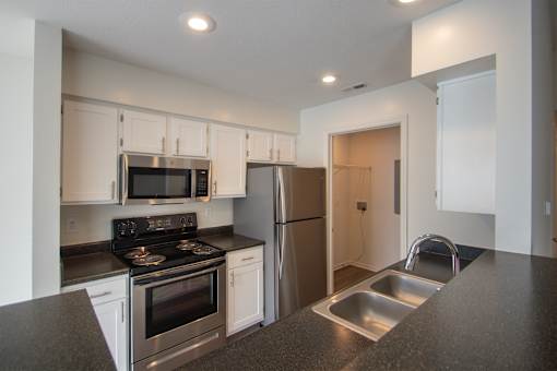 This is a photo of the kitchen of the 900 square foot 2 bedroom Miamisburg floor plan at Washington Park Apartments in Centerville, OH.