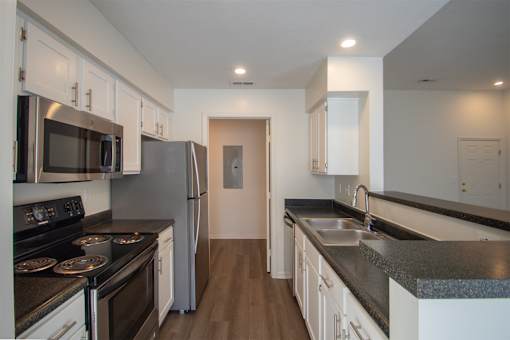 This is a photo of the kitchen of the 900 square foot 2 bedroom Miamisburg floor plan at Washington Park Apartments in Centerville, OH.